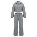 Grey cropped quarter-zip top and wide-leg trouser set on an invisible mannequin