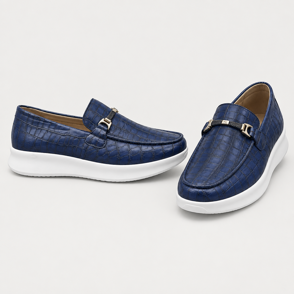 Navy blue embossed slip-on loafers with gold-tone vamp hardware
