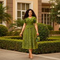 Women's olive green ruffle frill belted midi gown – Nigerian model lifestyle shot