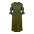 Olive patterned top and pleated maxi skirt on an invisible mannequin