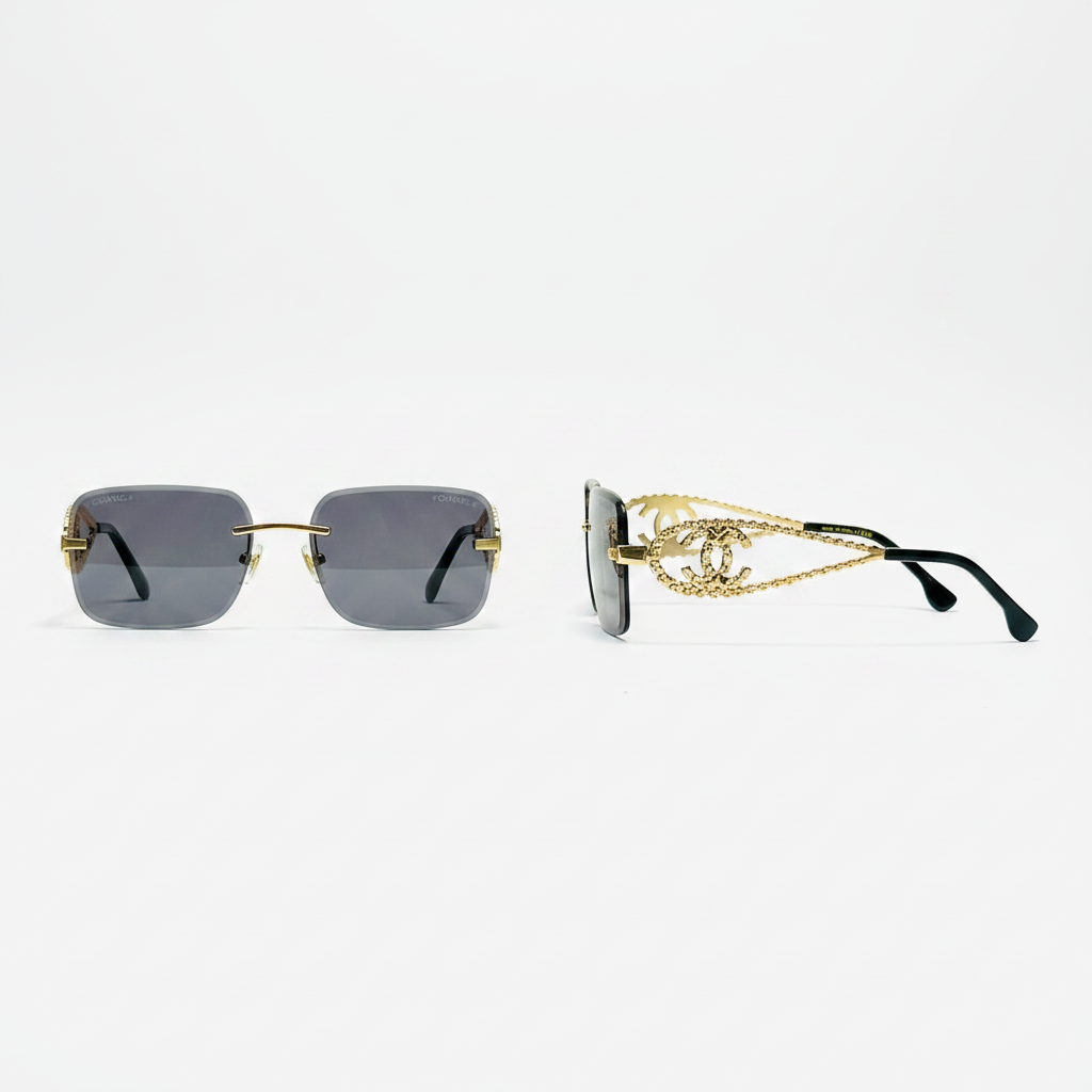 Unisex dark grey smoke lens rimless square sunglasses with gold chain-link temple arms – front and side view