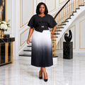 Woman wearing black-and-white ombré pleated ruffle dress