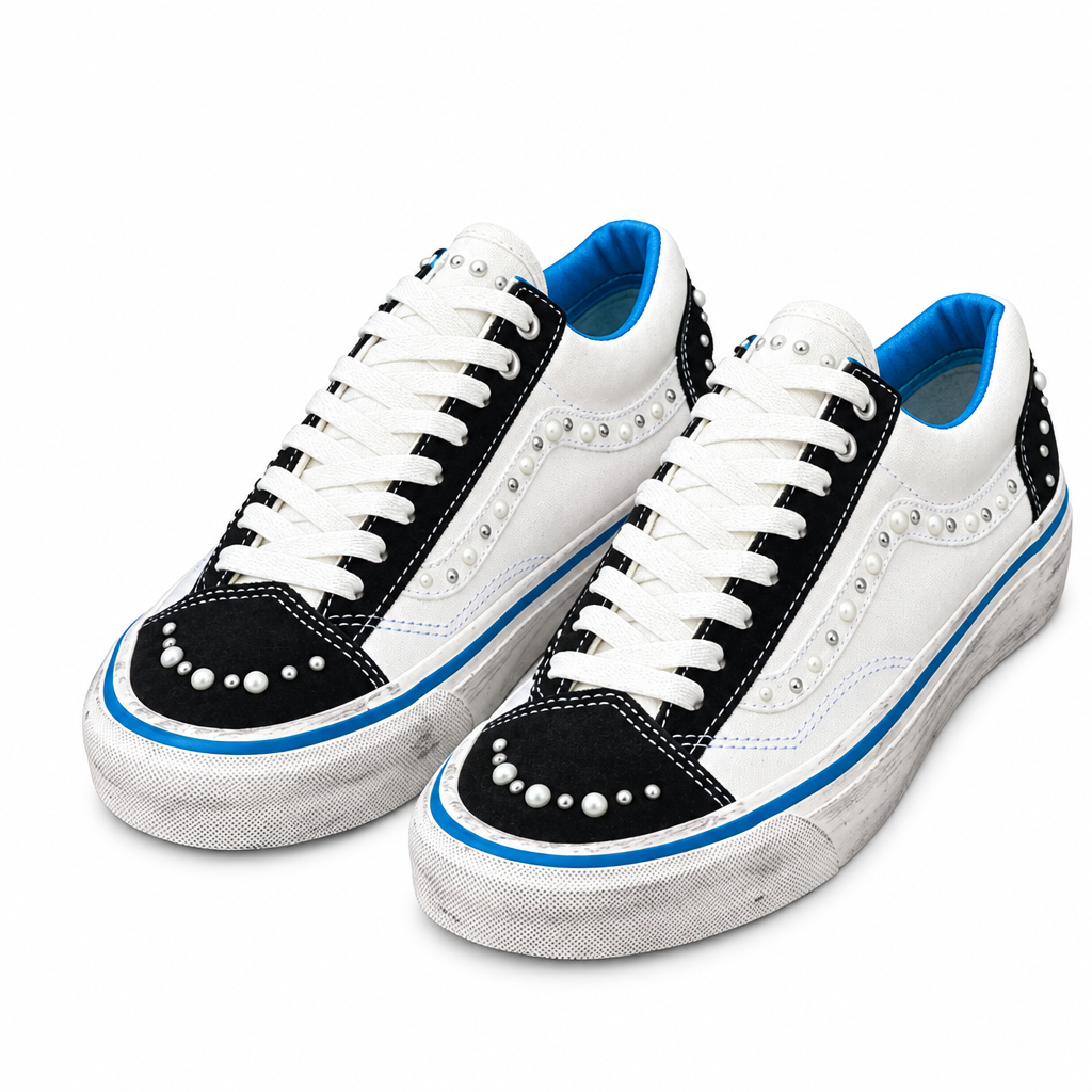White-and-black embellished sneakers with blue lining and sole stripes