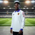 Nigerian male model wearing the white long-sleeve retro football jersey in a sports studio setting