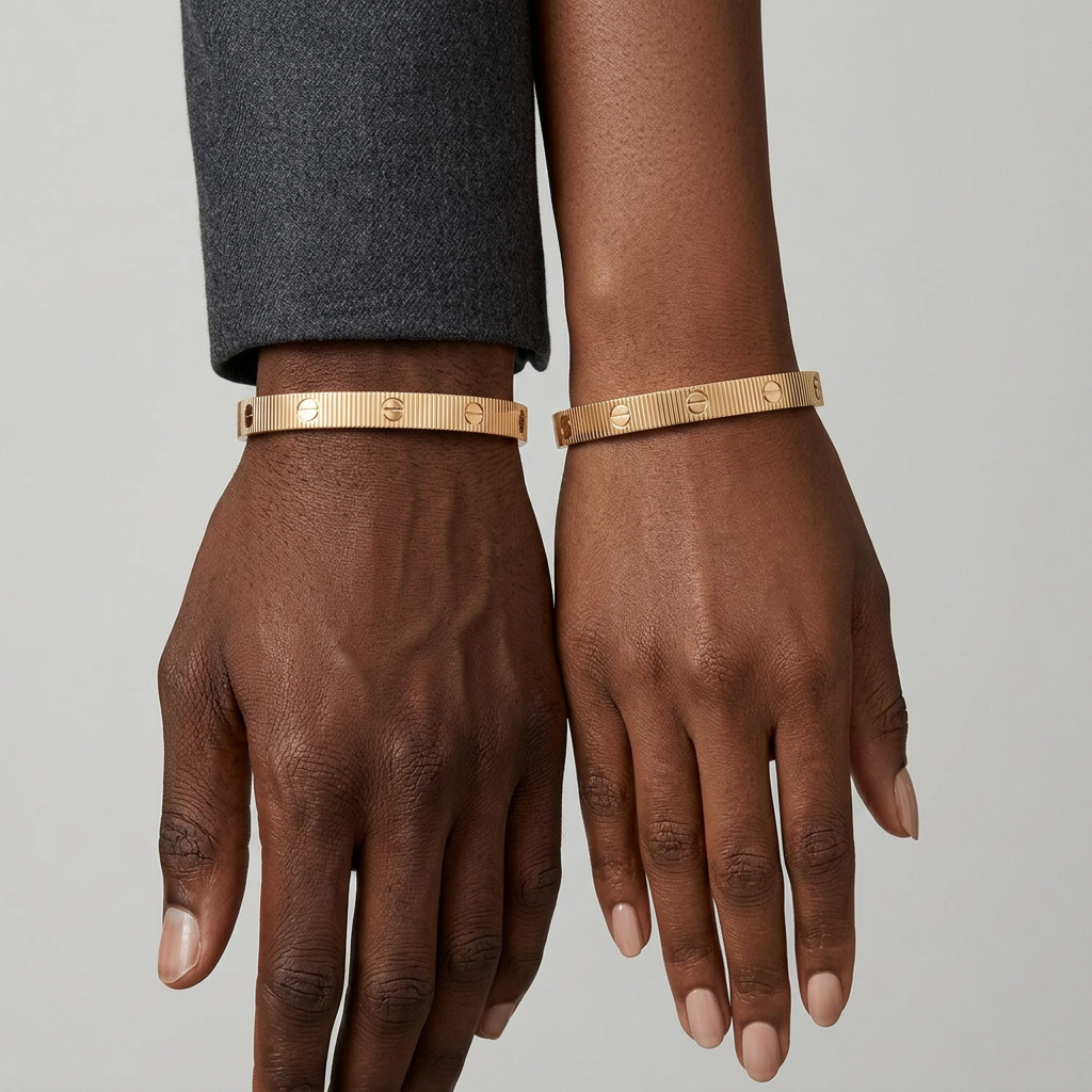 Gold-tone ribbed bracelet styled on male and female wrists