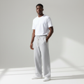 Male model wearing grey sweatpants