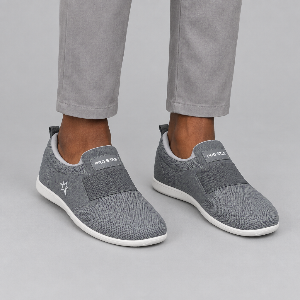 Both grey knit slip-on sneakers worn against a plain studio background