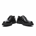Men's black croc-embossed Oxford shoe ghost mannequin pair front view