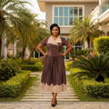 Women's chocolate brown scallop-trim pleated midi gown – Nigerian model lifestyle shot