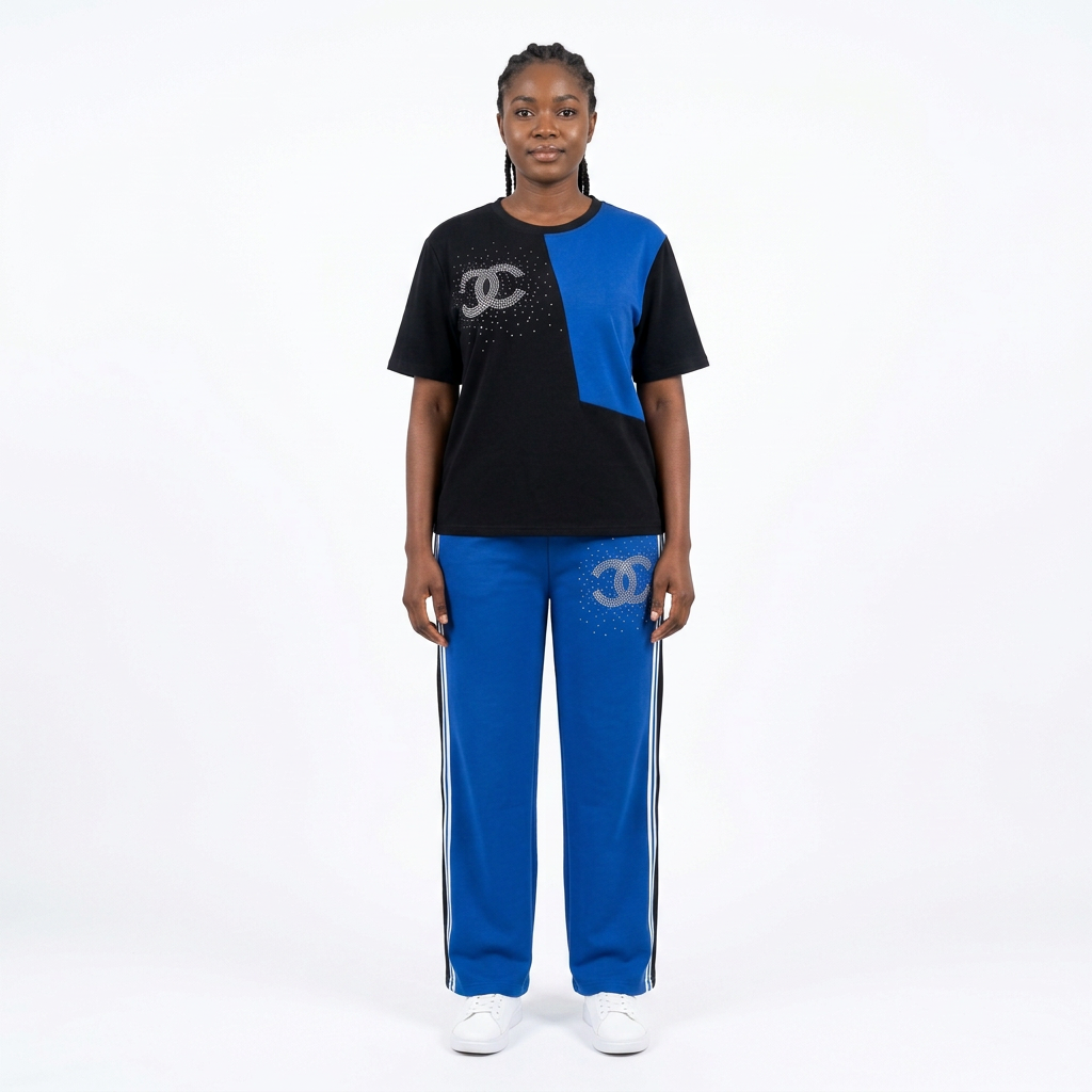 Black adult model wearing a black and blue colour-block trouser set