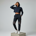 Nigerian female model wearing navy plaid cargo joggers