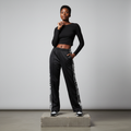 Nigerian model wearing black bandana tape track pants