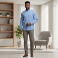 Young Nigerian male wearing powder blue mandarin collar long sleeve button-down shirt