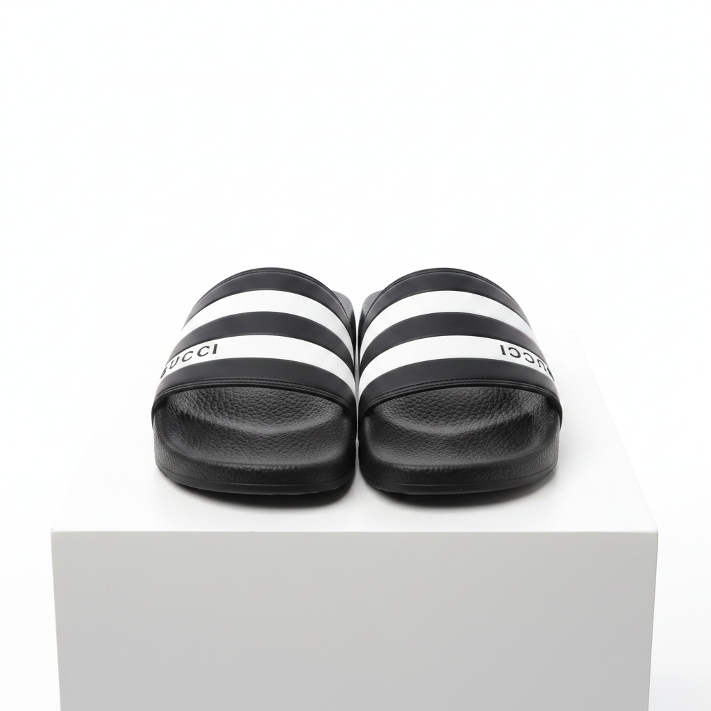 Men's black triple stripe slide sandals pair on white platform