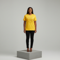 Nigerian female model front view wearing yellow tonal circular mythological face badge T-shirt