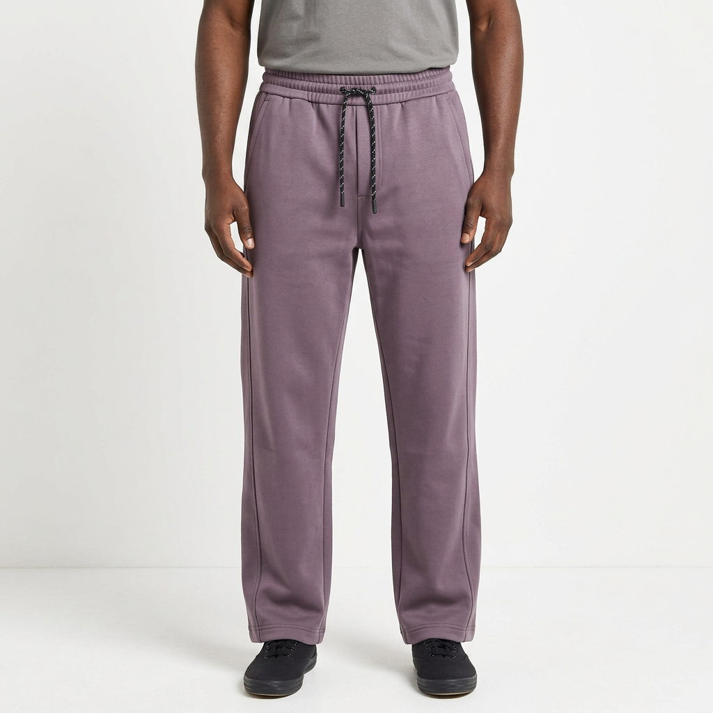 Adult Black model wearing muted purple straight-leg drawstring joggers