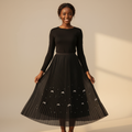Nigerian girl wearing black bow pleated midi skirt - front view