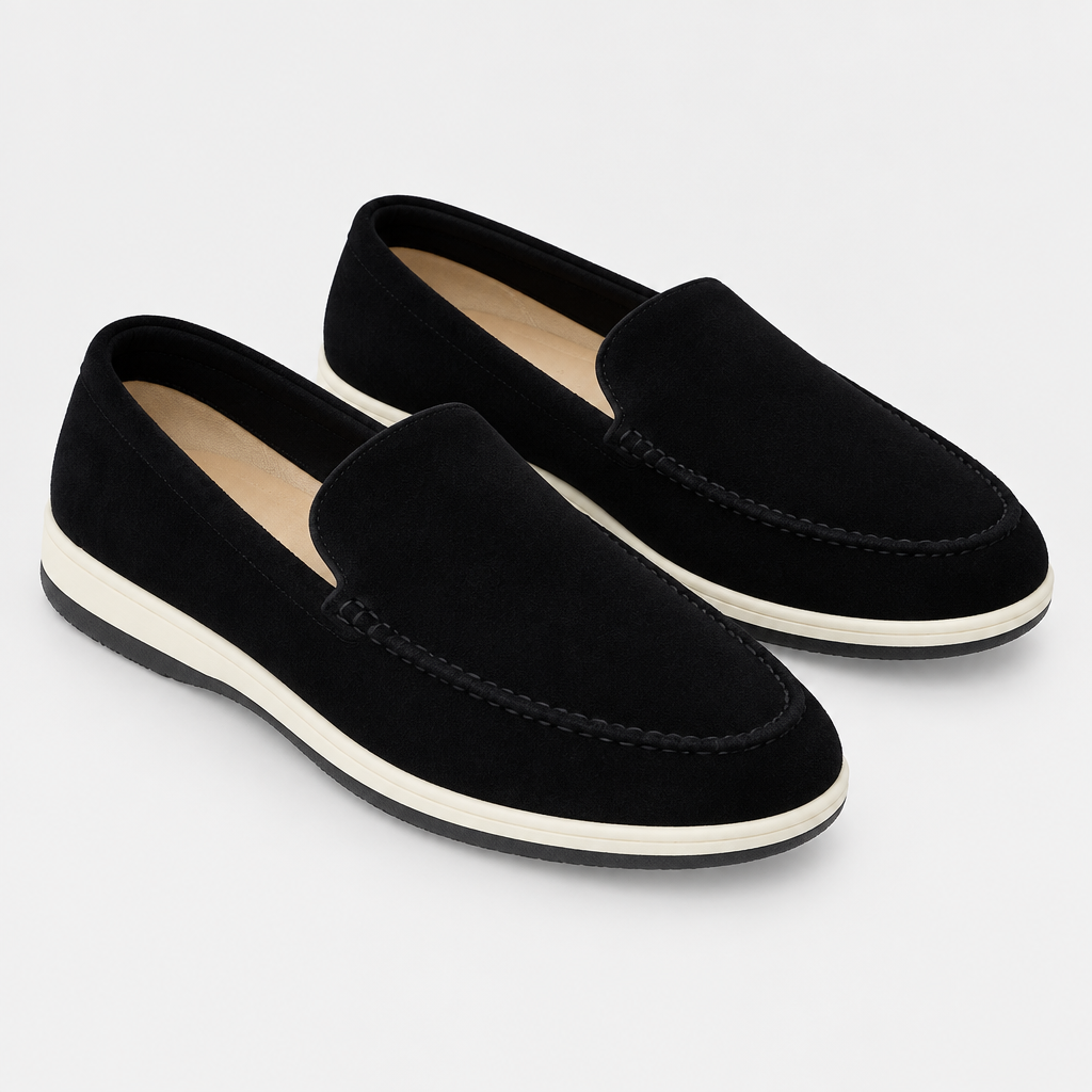 Black slip-on loafer pair on a clean background
