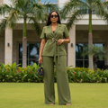 Women's short-sleeve tie-waist blazer co-ord set in olive green – Nigerian female model front view