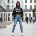 Young Nigerian female model wearing signature slogan black lace crop tee
