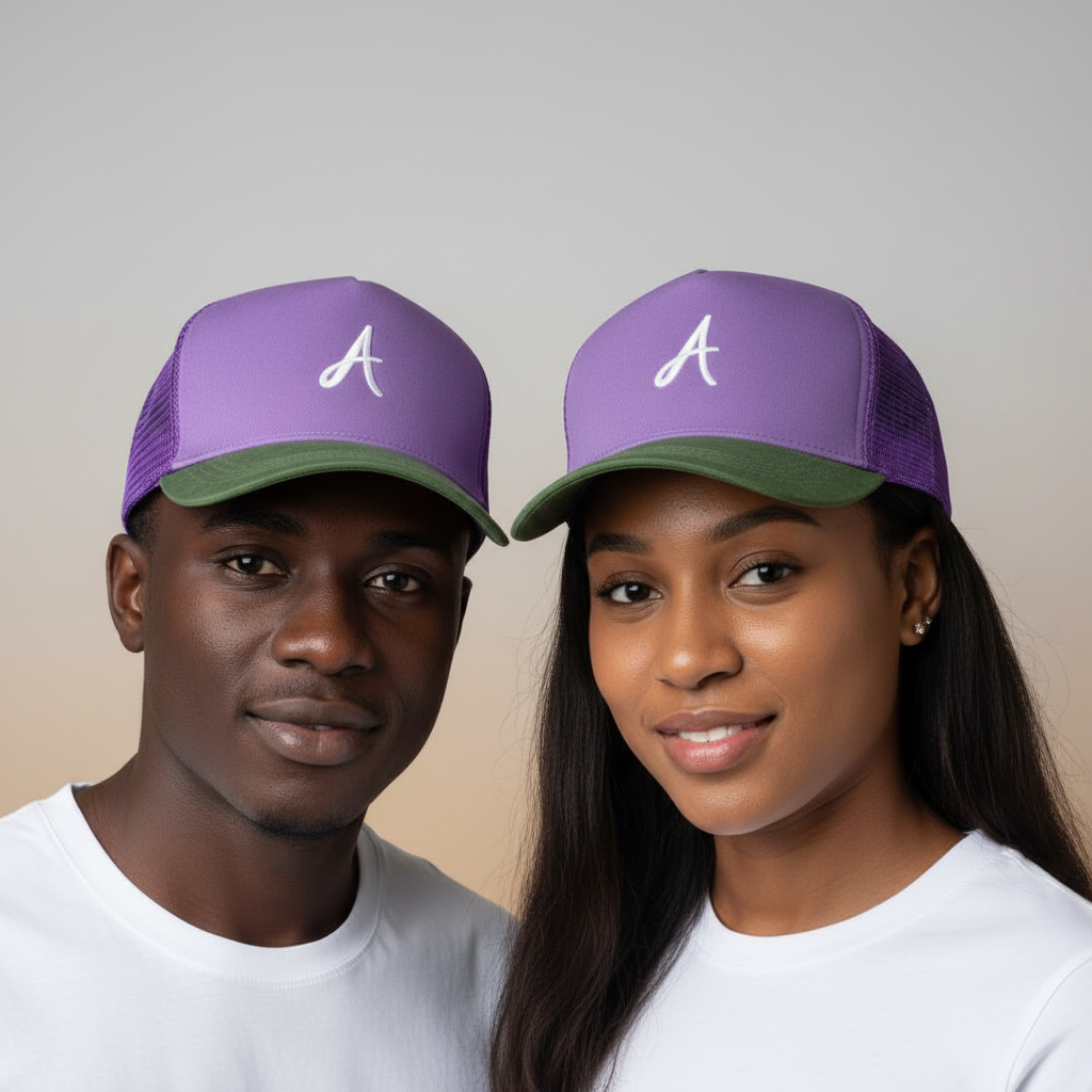 Nigerian male and female models wearing purple and olive green A script trucker cap