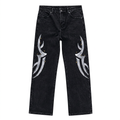 Black wide-leg jeans with silver-white abstract graphics and small star accents