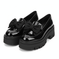 Women's black patent leather chunky platform bow loafer — ghost mannequin pair view, left and right shoe