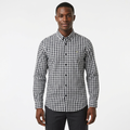 Adult Black model wearing a black and white gingham long-sleeve shirt