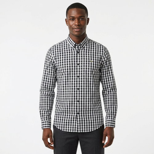 Adult Black model wearing a black and white gingham long-sleeve shirt