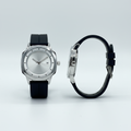 Silver-white dial wristwatch with a black strap shown from the front and side