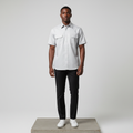 Nigerian male model wearing light grey solid short-sleeved shirt