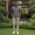 Young Nigerian male wearing charcoal diamond jacquard pattern short sleeve button-down shirt