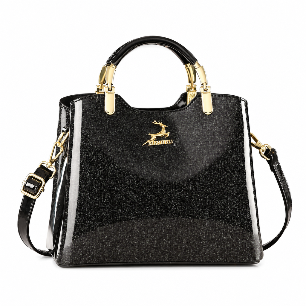 Structured black handbag with curved handles and gold-tone hardware on white