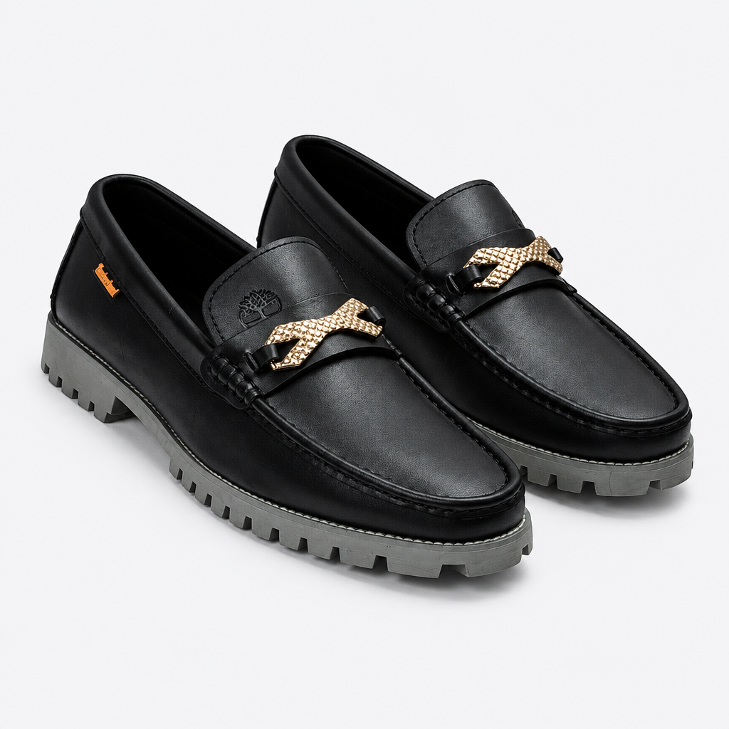 Black men's woven-detail lug-sole loafers shown as a complete pair