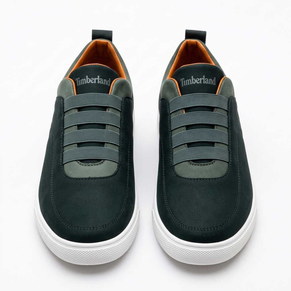 Straight-on dark green elastic-band sneakers with lighter green trim and white soles