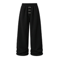 Black wide-leg trousers with three silver-tone front clasps