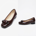 AI-generated catalog views of burgundy croc-textured bow flat shoes