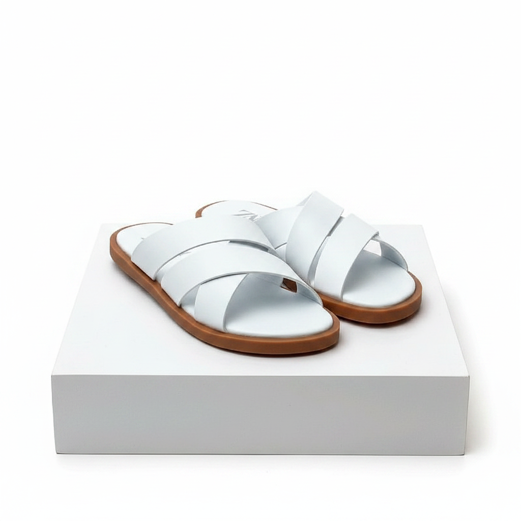 Men's white leather double cross-strap slide sandals pair on white platform