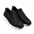 Pair of black slip-on shoes with contrasting white soles