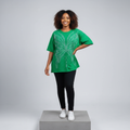 Nigerian female model front view - green rhinestone butterfly graphic top