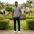 Nigerian male model wearing grey marl solid short sleeve polo shirt with white dotted stitch trim