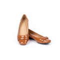Tan croc-embossed patent leather square-toe ballet flat with strap buckle — clean pair product shot