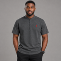 Model wearing charcoal grey stand-collar shirt with red chest detail