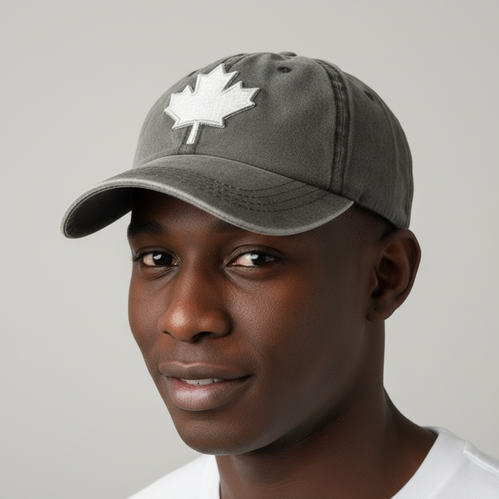 Nigerian male model wearing two-tone washed charcoal grey patch baseball cap – head shot
