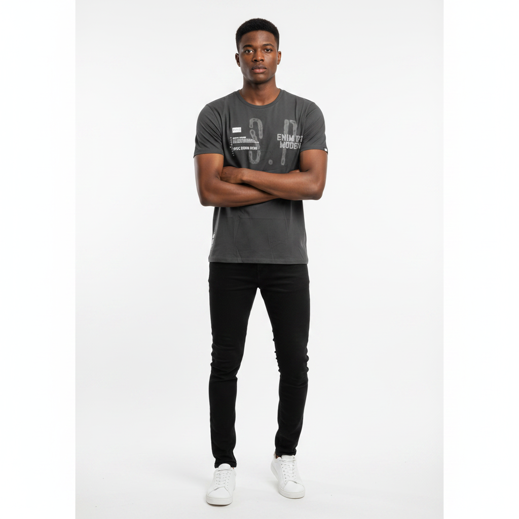 Young Nigerian male wearing dark charcoal SPCC Denim DVSN Modern Soldier graphic tee