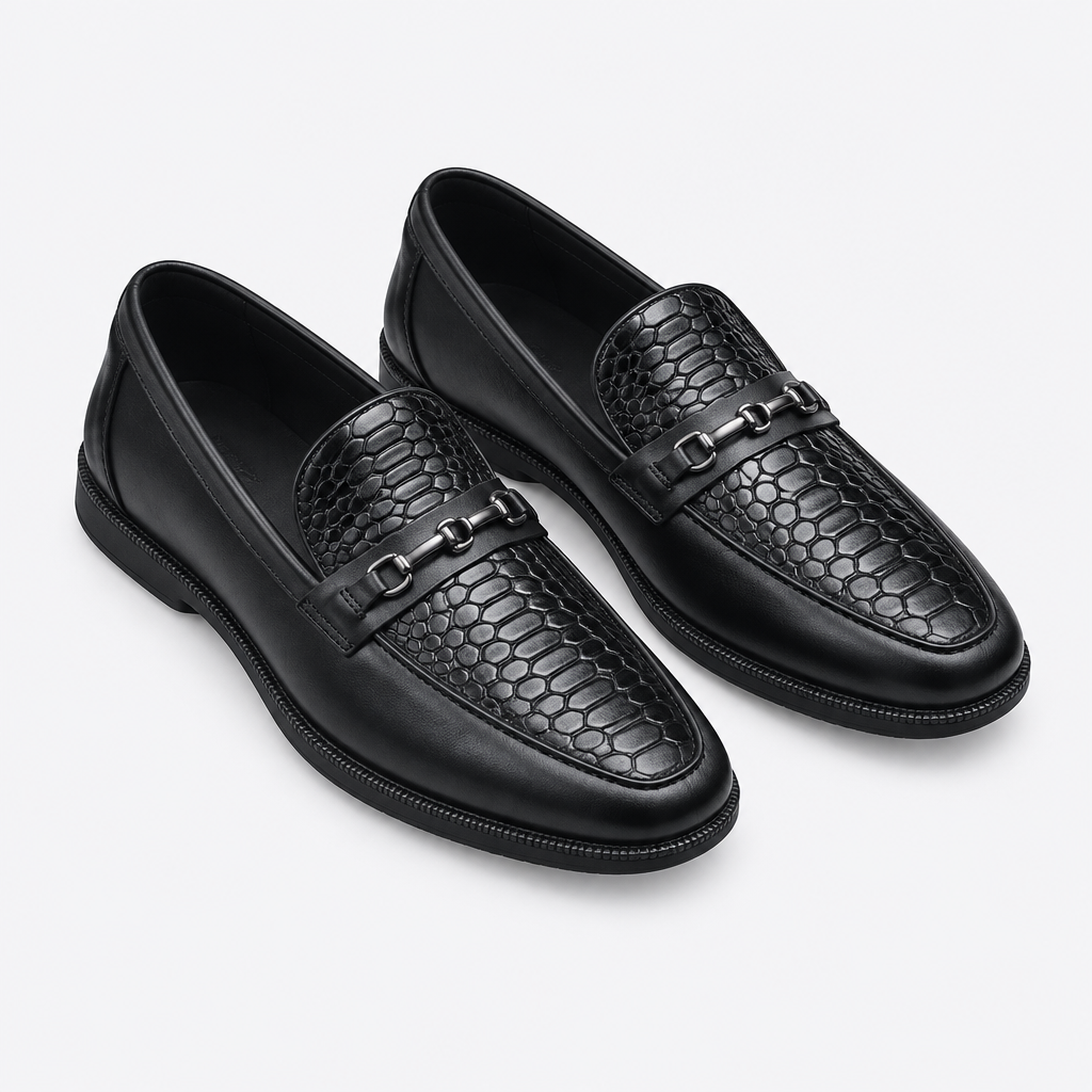 Black men's embossed-texture buckle loafers shown as a complete pair