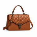 Cognac brown quilted top-handle bag with dark clasp and shoulder strap
