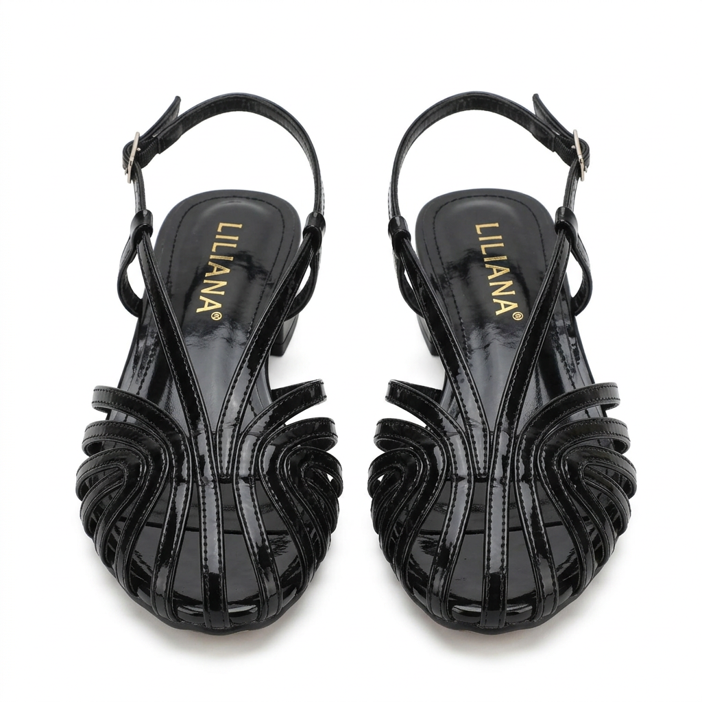 Black fan-strap cage slingback low-heel shoe pair