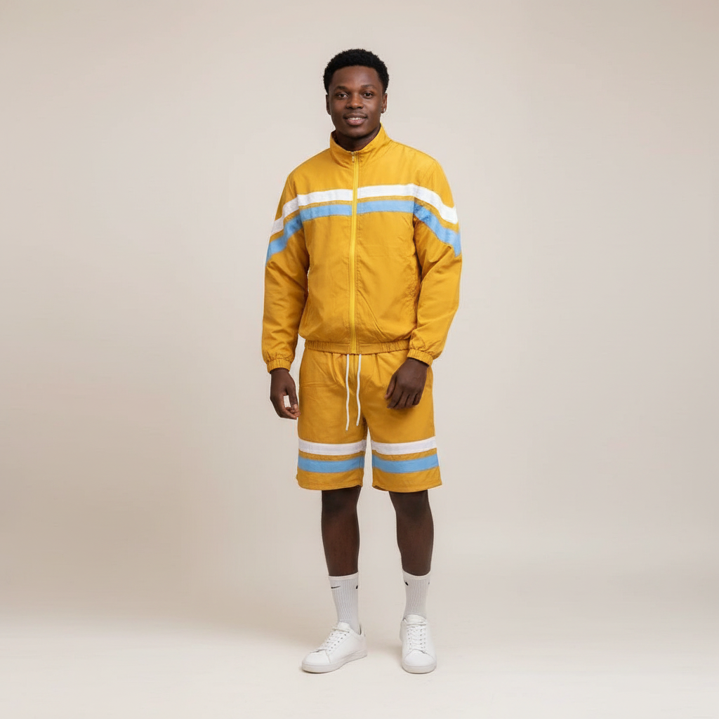 Model wearing the mustard yellow jacket and shorts set