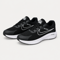 Pair of black mesh running sneakers with white side detailing and white soles